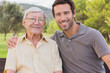 Portrait of father and adult son