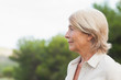 Thoughtful older woman looking into the distance
