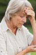 Older woman getting a headache