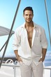 Photo: Summer portrait of handsome man on sailing boat Summer portrait of handsome man on sailing boat