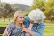 Little girl smiling and talking with her grandmother