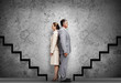 Two business people facing career progression