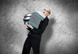 Businesswoman struggling with work load