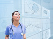 Nurse observing graphics on screen