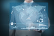 Businessman using world map interface