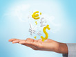 Businessman with currencies in his hand