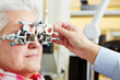 Senior with astigmatism and trial frame