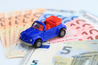 Photo: blaues Auto aus Euroscheinen blaues Auto aus Euroscheinen