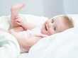 Photo: baby playing with his feet baby playing with his feet