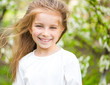 adorable little girl on the meadow