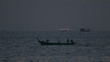 Fishing boats returning to the port at dusk.