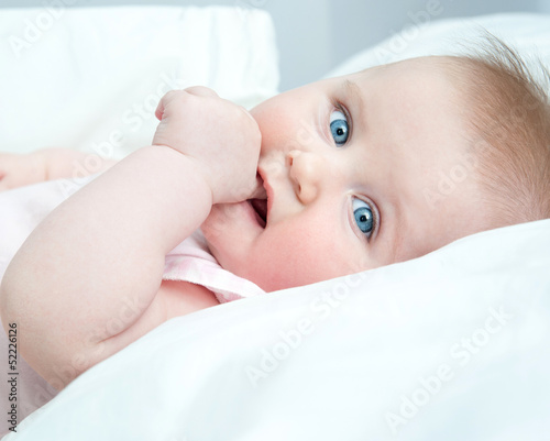 Photo: cute baby sucks his thumb cute baby sucks his thumb