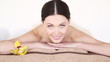 happy woman relaxing in spa salon