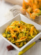 Foto: pasta with zucchinis flower and saffron, selective focus pasta with zucchinis flower and saffron, selective focus