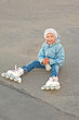 beautiful smiling girl with rollers sitting
