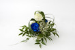 Blumengesteck mit blauer Rose