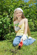 Foto: Girl gardening in the summer Girl gardening in the summer