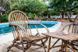 Chairs on swimming pool border