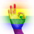 hand OK sign with rainbow flag