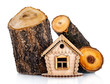 Wooden model of house and stack of wood. Concept