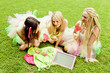 group of beautiful female friends smiling.  three pretty  girls