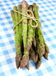 Green asparagus on white and blue checkered background