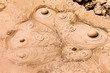 Bubbling hot mud geothermal spring background