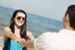 Foto: Beautiful couple on the beach Beautiful couple on the beach