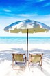 Two chairs and umbrella on stunning tropical beach, Thailand