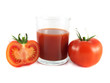 Red ripe tomato, slice with glass of tomato juice