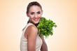woman with bundle herbs (salad). Concept vegetarian dieting - he