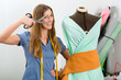 Fashion designer or tailor working in studio