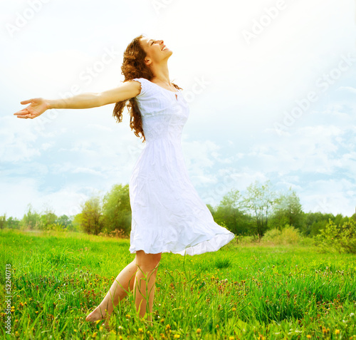 Photo: Enjoyment. Free Happy Woman Enjoying Nature. Girl Outdoor Enjoyment. Free Happy Woman Enjoying Nature. Girl Outdoor