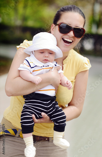 Photo: happy mother with baby son happy mother with baby son