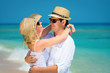 Photo: Loving couple on a clean blue sea Loving couple on a clean blue sea