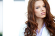 young brunette woman portrait in summer color