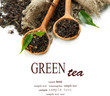 Dry tea with green leaves in wooden spoons, isolated on white
