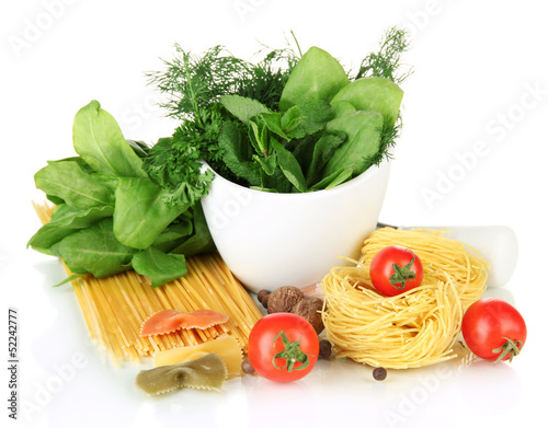 Photo: Composition of mortar, pasta and green herbals, isolated Composition of mortar, pasta and green herbals, isolated