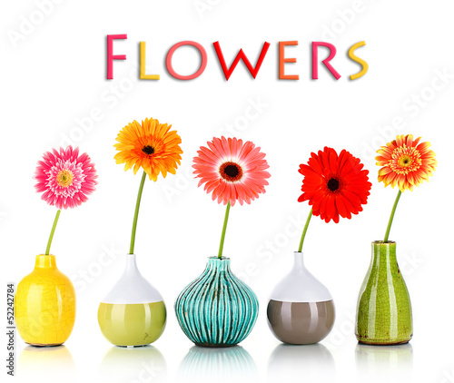 Photo: Beautiful Gerber flowers isolated on white Beautiful Gerber flowers isolated on white
