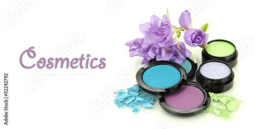 Photo: Beautiful bright eye shadows isolated on white Beautiful bright eye shadows isolated on white