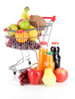 Different fruits in trolley with juice isolated on white