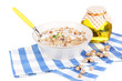 Useful oatmeal in bowl isolated on white