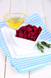 Sliced beetroot on bowl on wooden table close-up