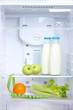 Open refrigerator with diet food