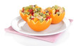 Fruit salad in hollowed-out orange isolated on white