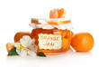 Orange jam with zest and tangerines, isolated on white