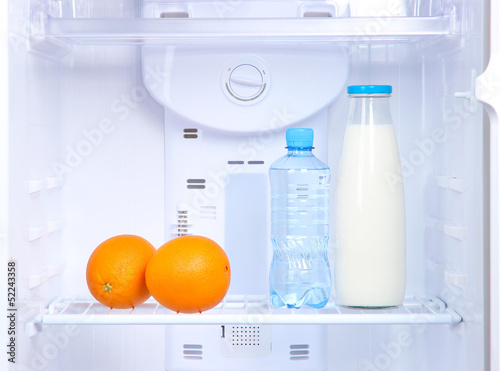 Photo: Open refrigerator with diet food Open refrigerator with diet food