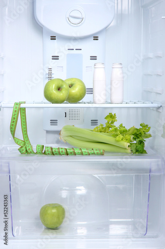 Photo: Open refrigerator with diet food Open refrigerator with diet food