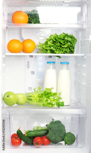 Photo: Open refrigerator with vegetarian food Open refrigerator with vegetarian food