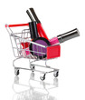 Cosmetics in cart isolated on white